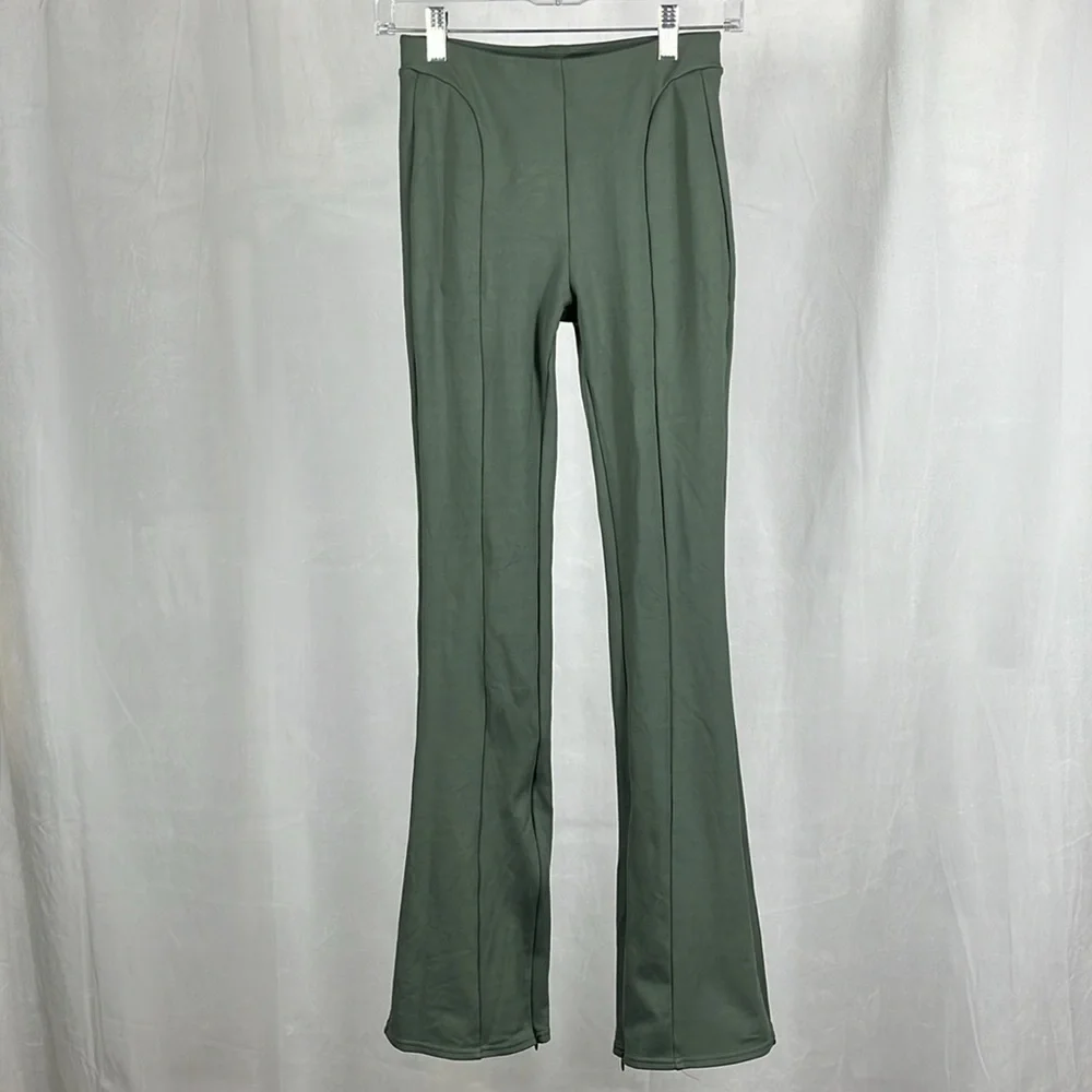 Alo‎ Yoga High-Waist Zip it Flare Legging in Dark Cactus Green.